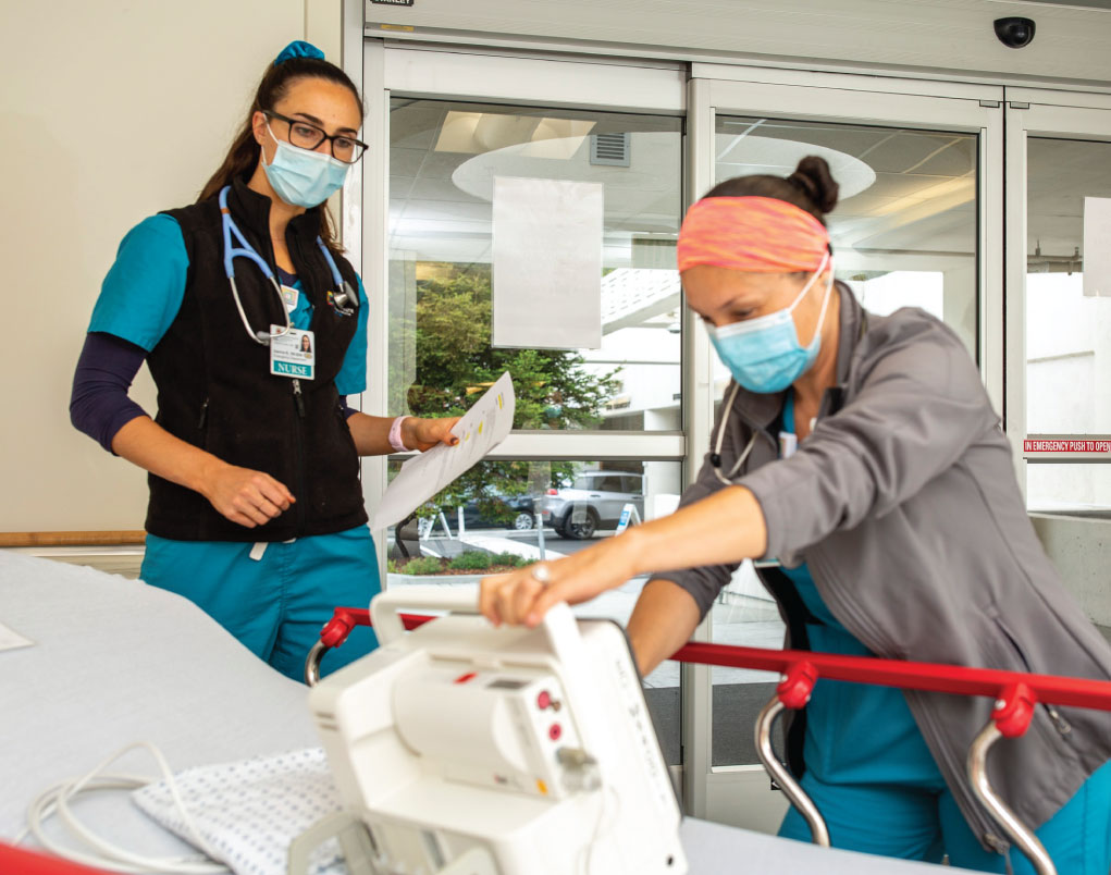 Emergency department —  nurses waiting at the ambulance bay to receive a stroke patient